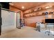 Bright office features built in shelving, modern desk, and stylish glass paneled entry door at 12199 Canyon Sunset St, Las Vegas, NV 89138
