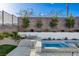 Inviting spa next to a brick wall featuring an outdoor lounge area perfect for relaxing at 12199 Canyon Sunset St, Las Vegas, NV 89138
