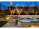 Inviting backyard pool with spa, fire pit, and elegant landscaping perfect for outdoor entertaining at 12199 Canyon Sunset St, Las Vegas, NV 89138