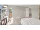 Bright bedroom space with carpet, ceiling fan, and view of the bathroom at 1405 Sycamore Spring Ct, Las Vegas, NV 89128