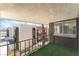 Balcony view showing turf carpet, black railing, and the well-maintained building exteriors at 1405 Vegas Valley Dr # 236, Las Vegas, NV 89169