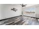 Bright bedroom with a ceiling fan, and a large window showcasing stunning views at 1405 Vegas Valley Dr # 236, Las Vegas, NV 89169