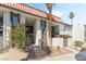 Well-kept apartment building exterior with red tile roofs, stairs, and well-maintained desert landscaping at 1405 Vegas Valley Dr # 236, Las Vegas, NV 89169