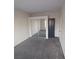 Bedroom featuring neutral carpet, closet, and natural light at 1621 Sandecker Ct # 104, Las Vegas, NV 89146