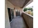 Patio featuring sliding glass doors and neutral paint at 1621 Sandecker Ct # 104, Las Vegas, NV 89146