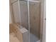 The shower features modern fixtures, neutral tile, and glass doors at 1621 Sandecker Ct # 104, Las Vegas, NV 89146