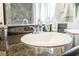Close-up of a bathroom sink with granite countertop and decorative elements at 1709 Chapman Dr, Las Vegas, NV 89104