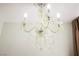 Close up of a beautiful crystal chandelier, adding an elegant and luxurious touch to the home's interior design at 1709 Chapman Dr, Las Vegas, NV 89104