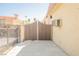 Driveway with ornate gate and view of the side of the home at 1709 Chapman Dr, Las Vegas, NV 89104