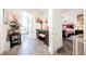 Hallway connects to a bathroom with flamingo decor and bedroom with a metal bed frame at 1709 Chapman Dr, Las Vegas, NV 89104
