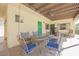 Inviting patio with comfortable seating, a covered ceiling and lush landscaping for relaxing outdoors at 1709 Chapman Dr, Las Vegas, NV 89104