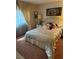 Bright and cozy bedroom with neutral-toned walls and decorative accents at 1801 Calle De Vega, Las Vegas, NV 89102