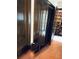 A large closet featuring dark wood doors for clothes and storage at 1801 Calle De Vega, Las Vegas, NV 89102