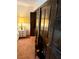 Bedroom with closet featuring dark wood doors and ample storage at 1801 Calle De Vega, Las Vegas, NV 89102