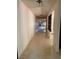 Long hallway featuring tile flooring and access to the living area at 1801 Calle De Vega, Las Vegas, NV 89102