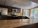 The kitchen features stainless steel appliances and a large window at 1801 Calle De Vega, Las Vegas, NV 89102