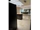 View of the open kitchen with granite counters and stainless appliances at 1801 Calle De Vega, Las Vegas, NV 89102