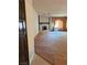 Spacious living room with a brick fireplace and large window at 1801 Calle De Vega, Las Vegas, NV 89102