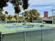 Well-maintained tennis courts surrounded by greenery, offering a picturesque setting for outdoor recreation at 1801 Calle De Vega, Las Vegas, NV 89102