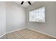 Bright bedroom with tile floors, a large window, and neutral paint tones at 1881 W Alexander Rd # 1135, North Las Vegas, NV 89032