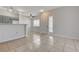 Open floorplan with kitchen and dining area featuring tile flooring and ample light at 1881 W Alexander Rd # 1135, North Las Vegas, NV 89032