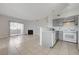 Open floorplan featuring combined living room and kitchen area and exterior sliding glass doors at 1881 W Alexander Rd # 1135, North Las Vegas, NV 89032