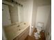 Small bathroom featuring a sink, toilet, and tile floor at 2282 Camel Mesa Dr, Laughlin, NV 89029