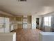 Bright kitchen featuring standard appliances, ample counter space, and tile flooring at 2282 Camel Mesa Dr, Laughlin, NV 89029