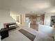 Open-concept living space with cozy fireplace, seamlessly connecting to the adjacent kitchen at 2282 Camel Mesa Dr, Laughlin, NV 89029