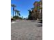 Entrance to Boca Raton Condominiums, surrounded by lush palm trees and manicured landscaping at 2455 W Serene Ave # 709, Las Vegas, NV 89123