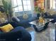 Stylish living room featuring large windows with a view and modern decor at 2455 W Serene Ave # 709, Las Vegas, NV 89123