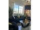 Stylish living room featuring large windows with a view and modern decor at 2455 W Serene Ave # 709, Las Vegas, NV 89123