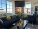 Stylish living room featuring large windows with a view and modern decor at 2455 W Serene Ave # 709, Las Vegas, NV 89123