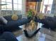 Stylish living room featuring large windows with a view and modern decor at 2455 W Serene Ave # 709, Las Vegas, NV 89123