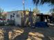 The backyard has equipment and other items and a shed at 2520 Sunrise St, Las Vegas, NV 89101
