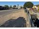 Shows a street view with cars parked and debris along the roadside at 2520 Sunrise St, Las Vegas, NV 89101