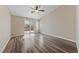 Inviting bedroom with wood floors and sliding glass door to the backyard at 274 Pear Meadow St, Henderson, NV 89012