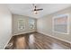 Bright bedroom with wood-look floors and large windows at 274 Pear Meadow St, Henderson, NV 89012