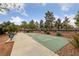 Enjoy outdoor recreation on shuffleboard courts in a well-maintained community area with mature landscaping at 274 Pear Meadow St, Henderson, NV 89012