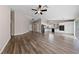 Spacious living room showcasing wood floors, high ceilings, and an open layout at 274 Pear Meadow St, Henderson, NV 89012
