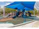 A fun-filled playground features colorful equipment and shaded areas for year-round enjoyment at 274 Pear Meadow St, Henderson, NV 89012