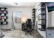 Bedroom workspace featuring custom shelving, a window, and modern chair at 2878 Chalk Mountain Ct, Las Vegas, NV 89142