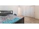 Bedroom featuring a comfortable bed, soft carpet, and a closet with sliding doors at 2878 Chalk Mountain Ct, Las Vegas, NV 89142