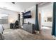 Bright primary suite featuring a television and luxurious ensuite bathroom with double vanities at 2878 Chalk Mountain Ct, Las Vegas, NV 89142