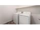 Laundry room with a white washer and dryer, and a shelf at 2878 Chalk Mountain Ct, Las Vegas, NV 89142