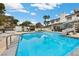Refreshing pool with slide, gazebo and outdoor bar creates backyard paradise perfect for relaxation and entertainment at 3010 La Mesa Dr, Henderson, NV 89014