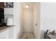 Tiled entryway leads into the home with updated light fixtures and decor at 3135 S Mojave Rd # 241, Las Vegas, NV 89121