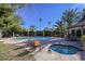 Community pool area, complete with lounge chairs, hot tub, and ample shade at 3135 S Mojave Rd # 241, Las Vegas, NV 89121