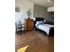 Comfortable bedroom design with hardwood floors and modern furnishings at 353 E Bonneville Ave # 631, Las Vegas, NV 89101