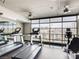 Gym featuring treadmills and fitness equipment with large windows showcasing views of the city at 353 E Bonneville Ave # 631, Las Vegas, NV 89101